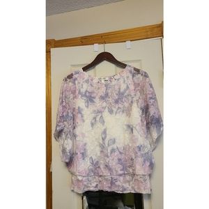 Pastel colored, floral patterned butterfly sleeve top
